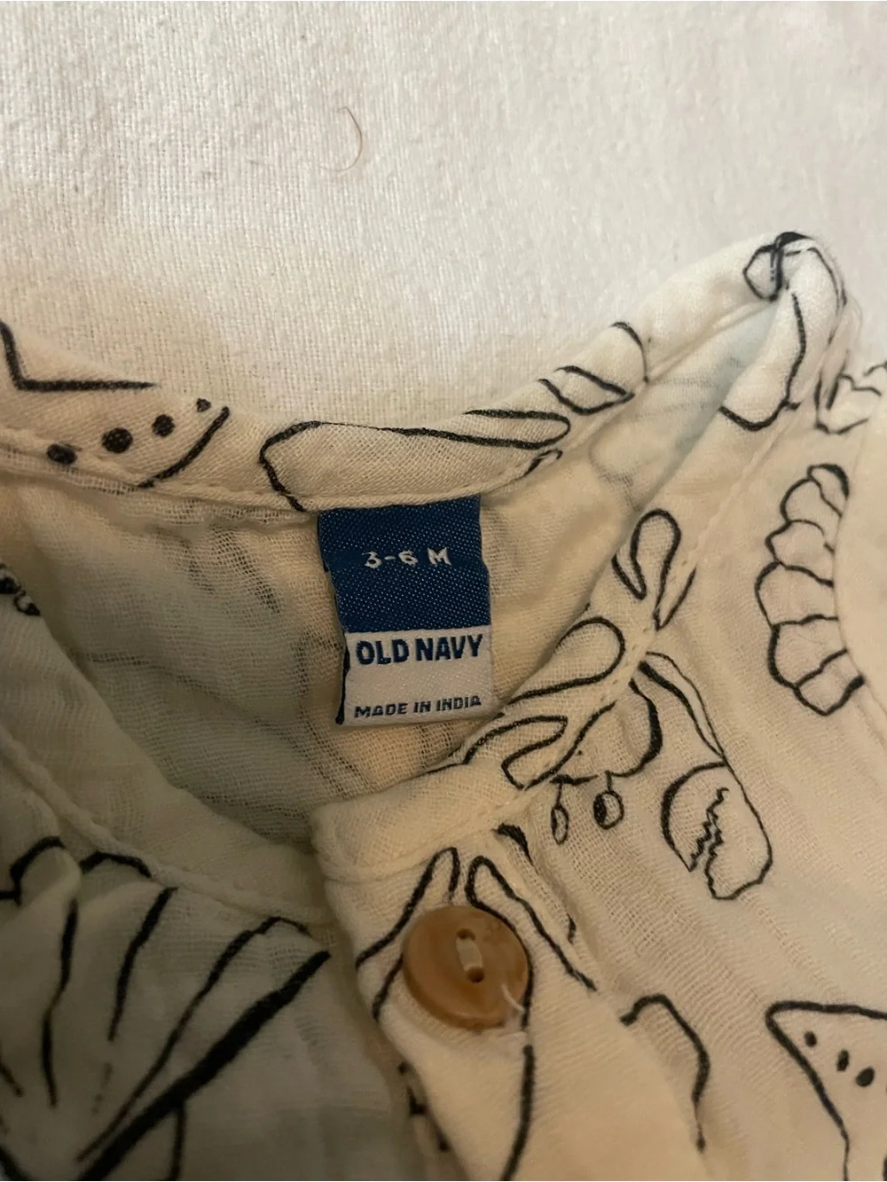 Old Navy Cream and Black Seashell Print Button Romper
